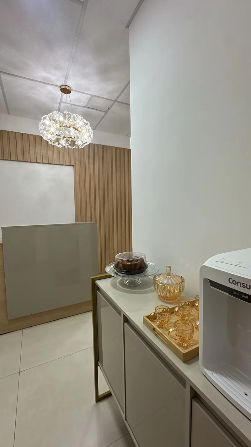 Área de apoio e café da recepção do consultório